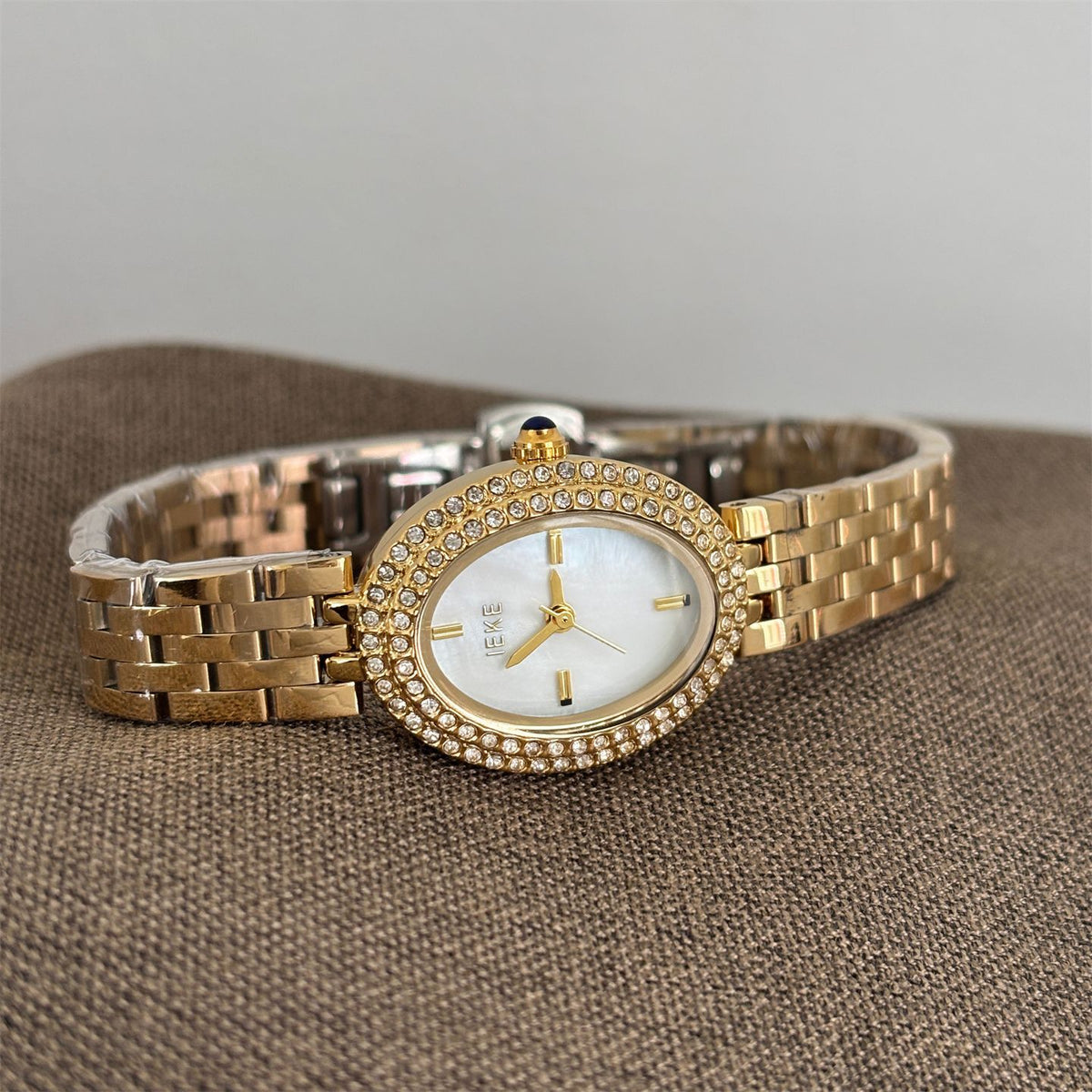 IEKE Full Pavé Crystal Pigeon Egg Oval Steel Watch - High Jewelry Cocktail Watch for Women